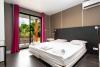Chambre avec lit double des villas de l'hotel Village de la pointe sur le spot du Vauclin en Martinique dans les Antilles