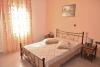 Lit double dans l'hotel Sunshine Appartements sur le spot de Naxos Saint Georges en Grèce