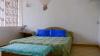 Chambre avec lit double du Pik Pik au Morne sur l'île Maurice