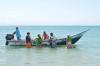Depart en bateau pour des downwinds en kitesurf le spot de El Yaque au Venezuela