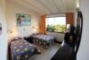 Interieur des chambres lits twin de l'hotel Surf Paradise sur le spot de kitesurf et de windsurf El Yaque au Venezuela