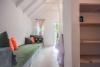 Intérieur des bungalows avec l'espace salon dans l'hôtel Fun Beach Resort