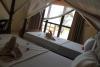 Intérieur des chambres standards twin à l'hôtel Mahali à zanzibar sur le spot de kitesurf à Paje