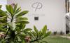 Logo de l'hôtel La Plénitude, à Saint Martin, sur les spots de Galion Beach et Orient Bay aux Antilles