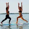 séance de SUP Yoga au centre KBC Sicily sur la lagon de Lo Stagnone